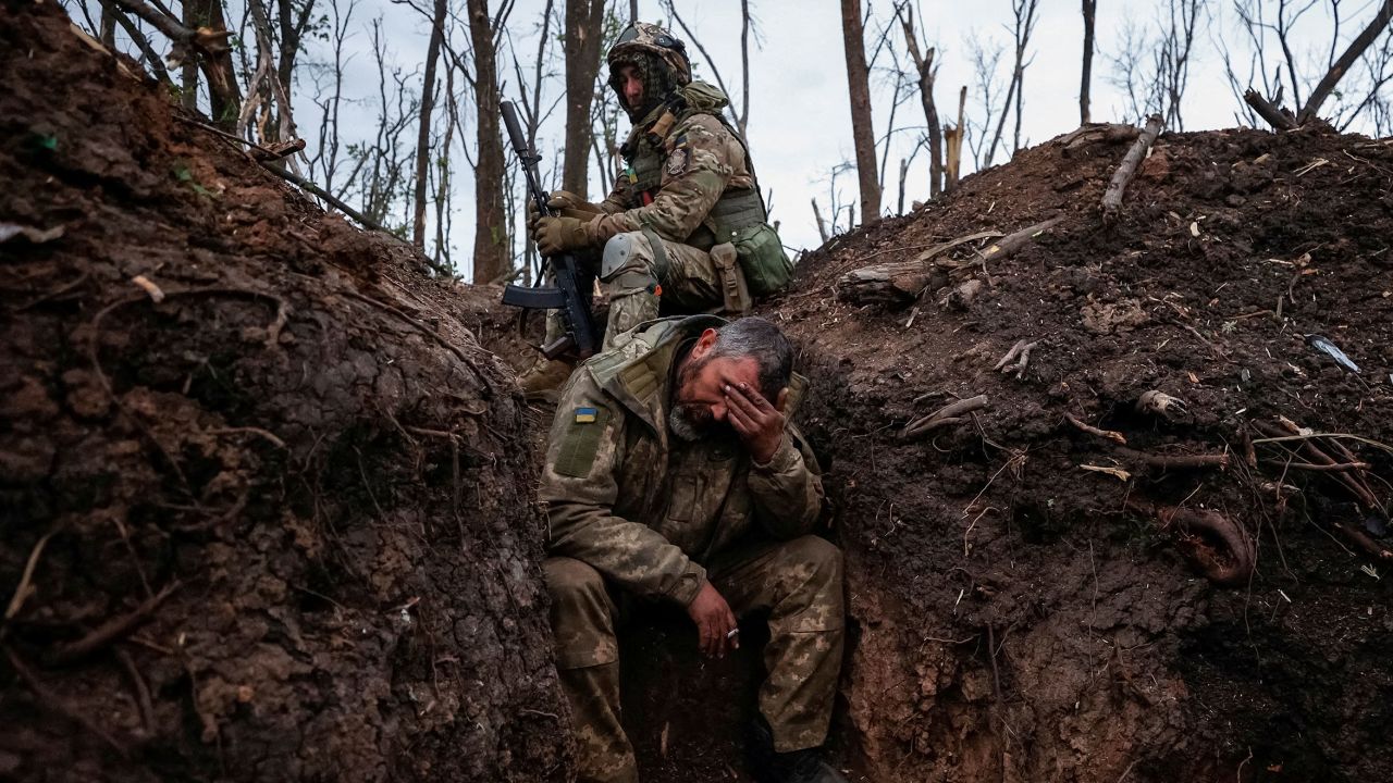 Ukrainian servicemen rest at their positions after a fight, as Russia's attack on Ukraine continues, near the front line city of Bakhmut, in Donetsk region, Ukraine, in May.