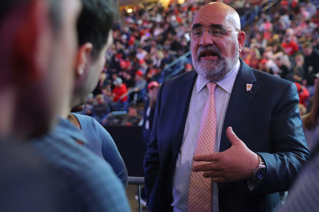 Chris Lacivita speaks to reporters before a campaign rally in Durham, New Hampshire, on December 16, 2023.
