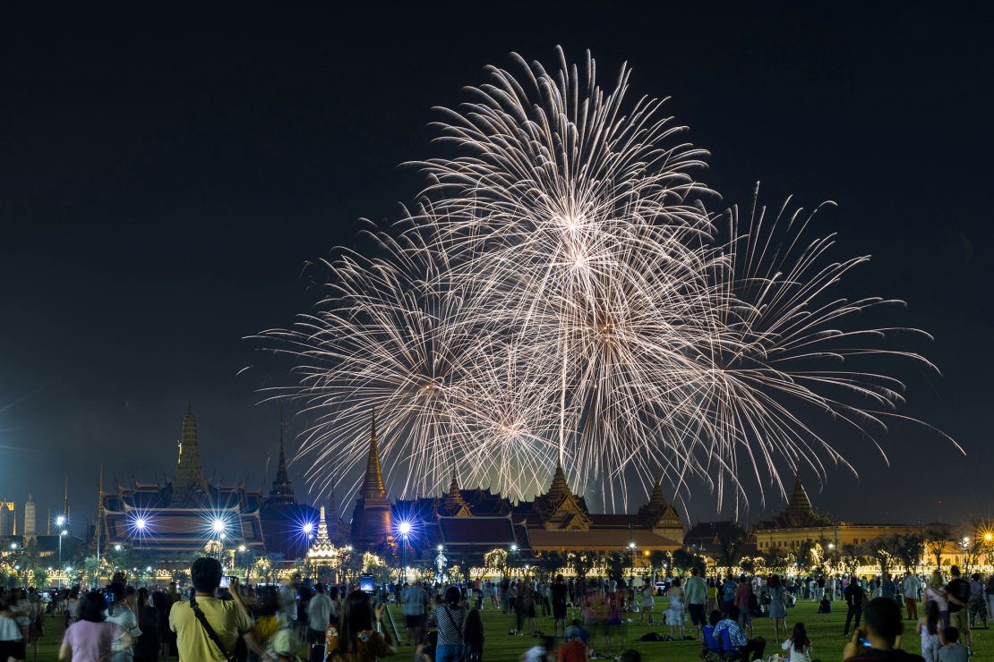 Fireworks explode over the Grand Palace during the 2024 New Year celebrations in Bangkok, Thailand.