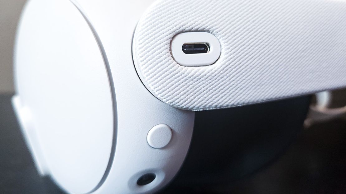 The side port of a white virtual reality headset.
