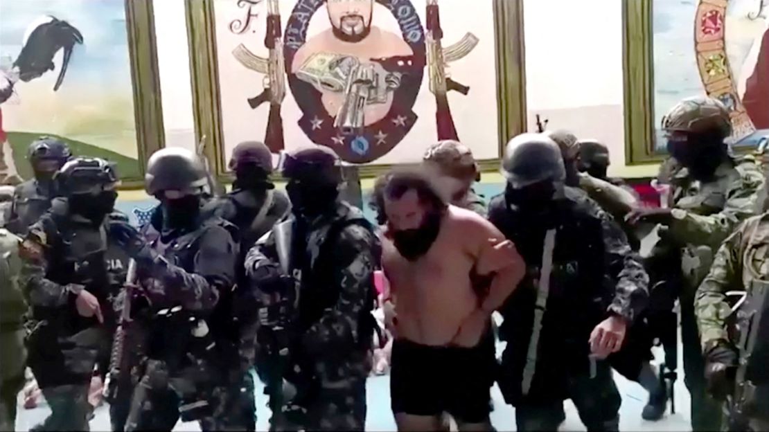 Members of the police and military escort Jose Adolfo Macias at Guayaquil prison, Ecuador, August 12, 2023, in a screengrab from a video provided by the Ecuadorean Police.