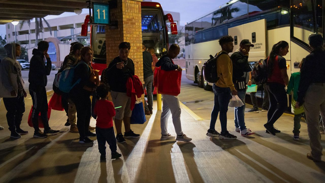 Migrants board a bus to Chicago, in downtown Brownsville, Texas, U.S., October 24, 2023. The Republican-led state of Texas said it has spent more than $100 million since April 2022 to bus tens of thousands of migrants who recently crossed the U.S.-Mexico border to Chicago, New York, Denver, and other Democratic-led cities. REUTERS/Carlos Barria SEARCH "BARRIA MIGRANTS BUS" FOR THIS STORY. SEARCH "WIDER IMAGE" FOR ALL STORIES. TPX IMAGES OF THE DAY