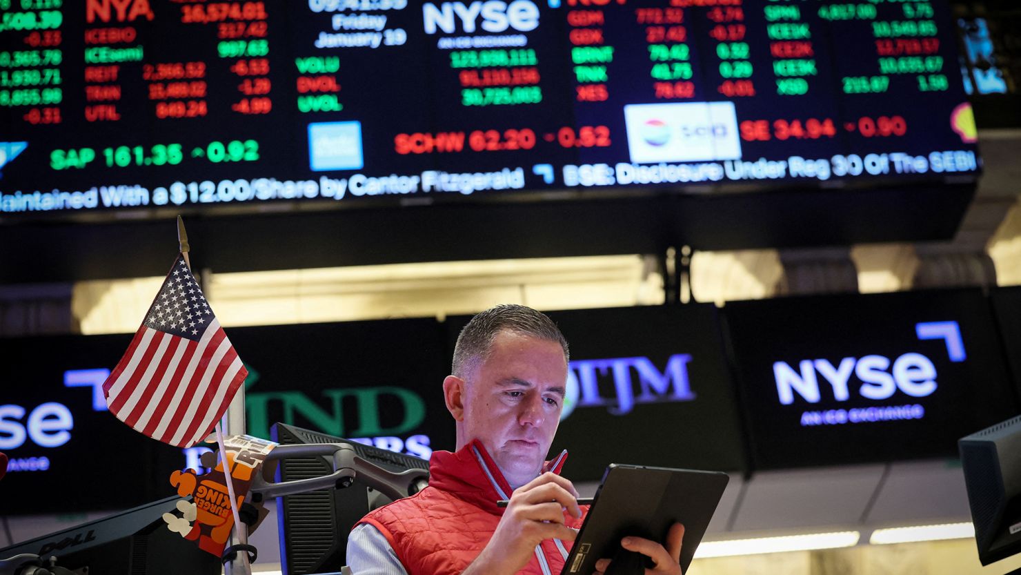 A trader works on the floor at the New York Stock Exchange on January 19, 2024.