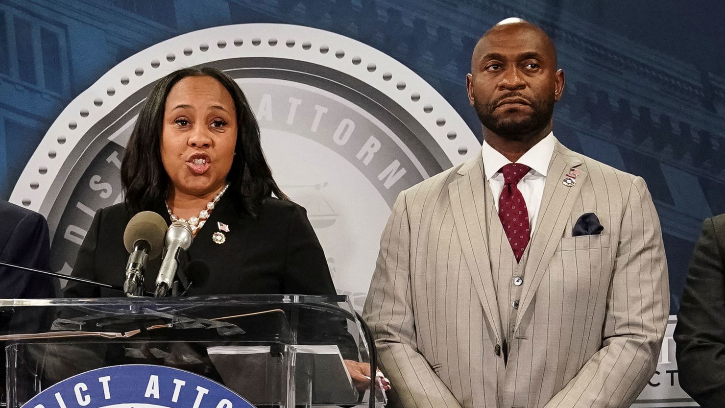 Fulton County District Attorney Fani Willis speaks at a news conference next to prosecutor Nathan Wade in Atlanta on August 14, 2023.