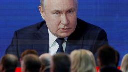 Russian President Vladimir Putin is seen on a screen during a meeting with his confidants for the 2024 election at Gostiny Dvor in Moscow, Russia January 31, 2024. REUTERS/Maxim Shemetov