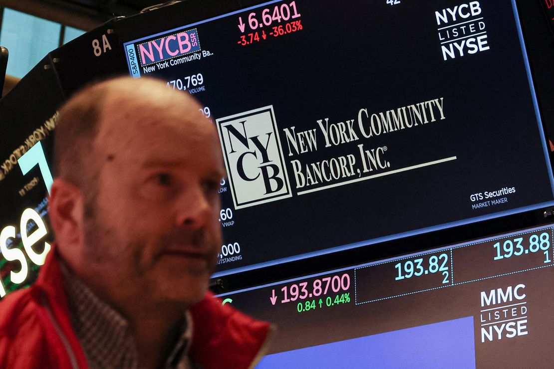 A screen displays the trading information for New York Community Bancorp at the New York Stock Exchange on January 31, 2024.