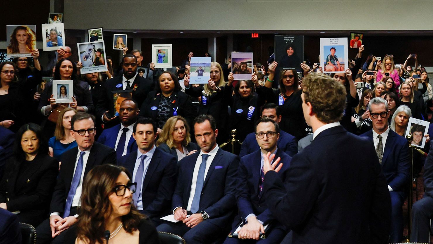 Meta's CEO Mark Zuckerberg stands and faces the audience as he testifies during the Senate Judiciary Committee hearing on online child sexual exploitation at the U.S. Capitol in Washington, U.S., January 31, 2024.