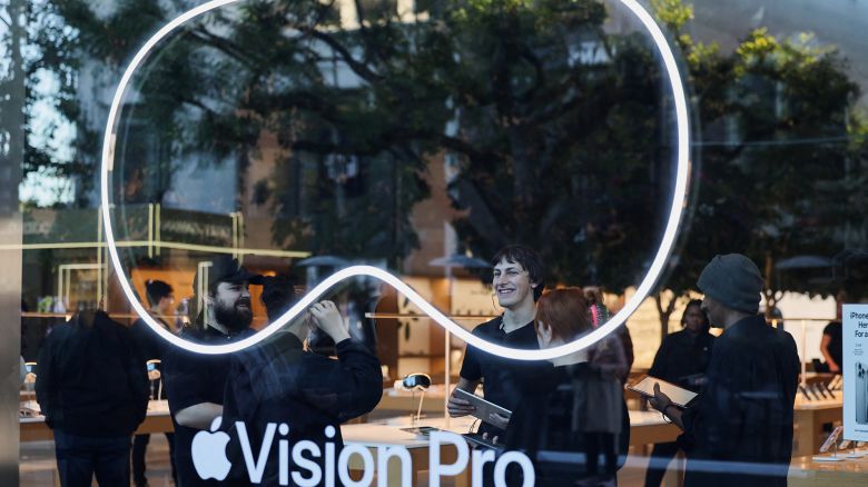Employees stand in an Apple store on the day Apple's Vision Pro headset goes on sale for the first time in Los Angeles, California, U.S., February 2, 2024.