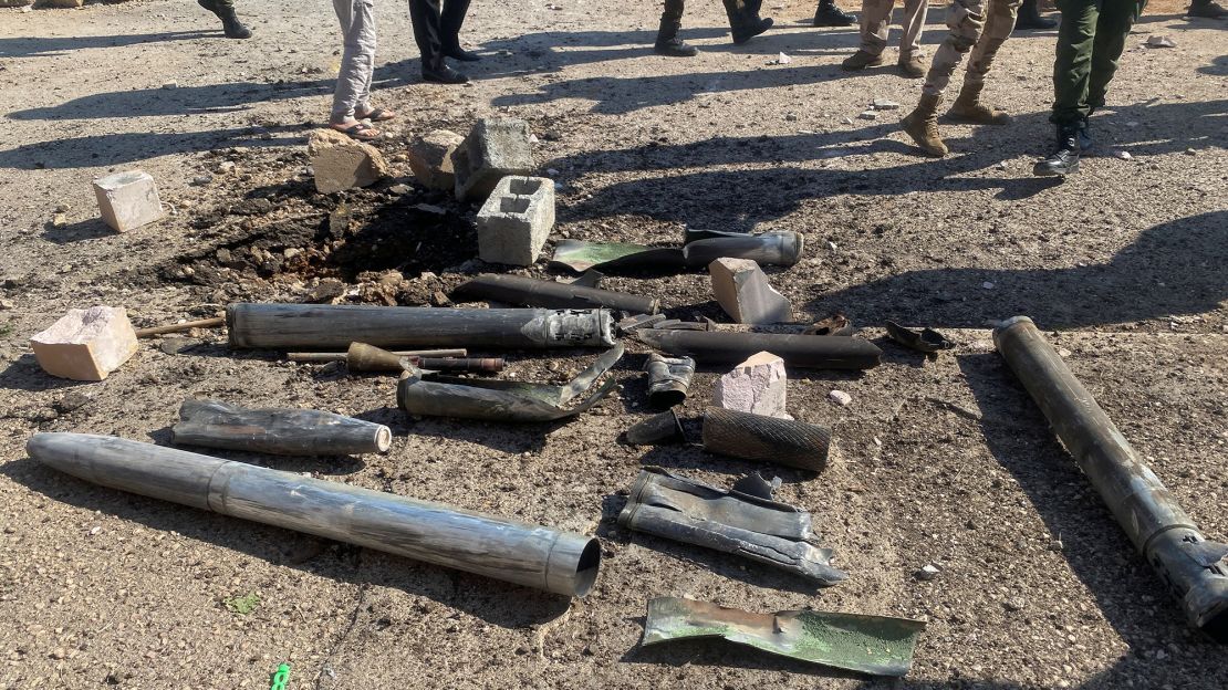 Shell casings lie at the site of a US airstrike in Al Qaim, Iraq, February 3, 2024.
