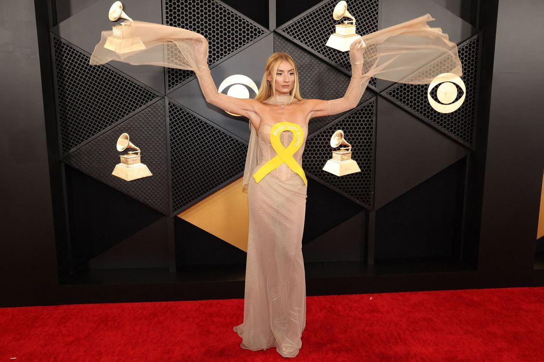 Montana Tucker poses on the red carpet at the Grammy Awards on Sunday.