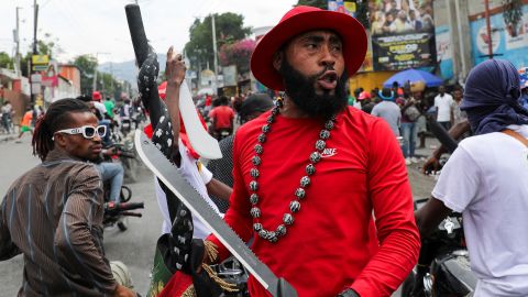 Opposition activist Marcelin Myrthil AKA Arab holds a machete during a protest against the government and calls for the resignation of Prime Minister Ariel Henry, in Port-au-Prince, Haiti February 5, 2024. REUTERS/Ralph Tedy Erol