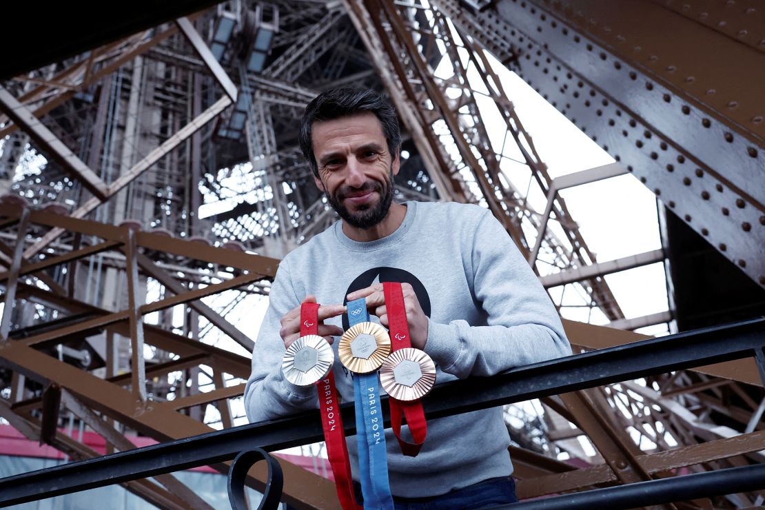 Tony Estanguet, president of Paris 2024, with Olympics medals.