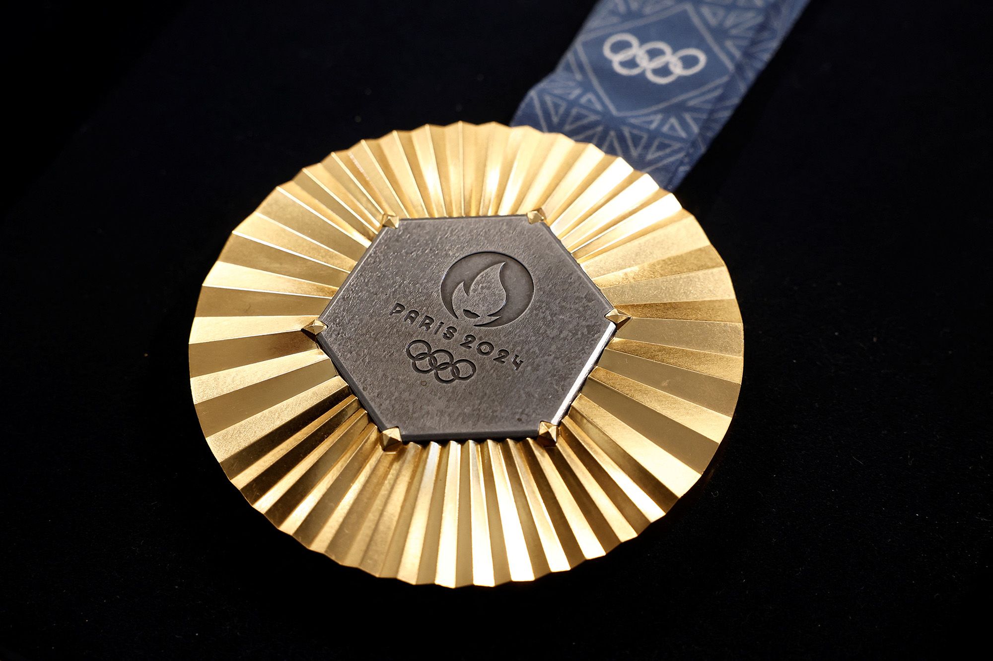A gold medal featuring iron from the iconic Eiffel Tower, designed by jeweller Chaumet. The medals will be awarded at the upcoming Paris 2024 Olympic Games.