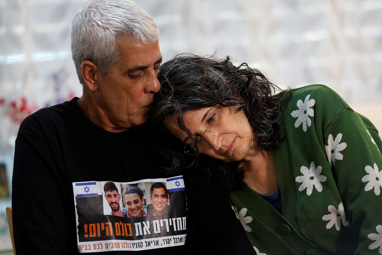 Yechi Yehoud, father of Arbel, kisses his wife Yael at their home in Rishon LeZion, Israel, on February 6.