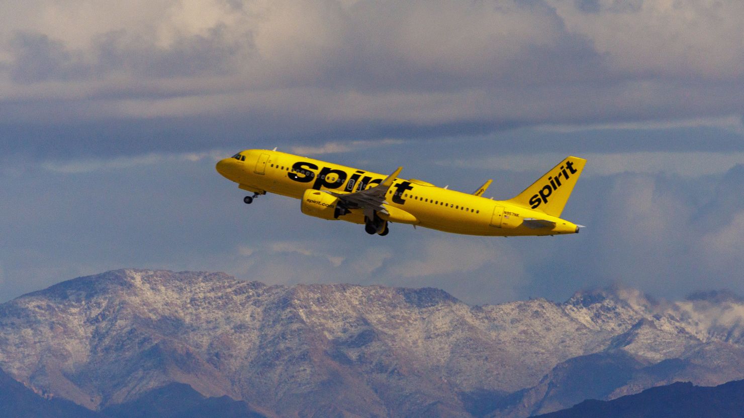 A Spirit Airlines commercial airliner flies after taking off from Las Vegas International Airport in Las Vegas, Nevada, U.S., February 8, 2024.