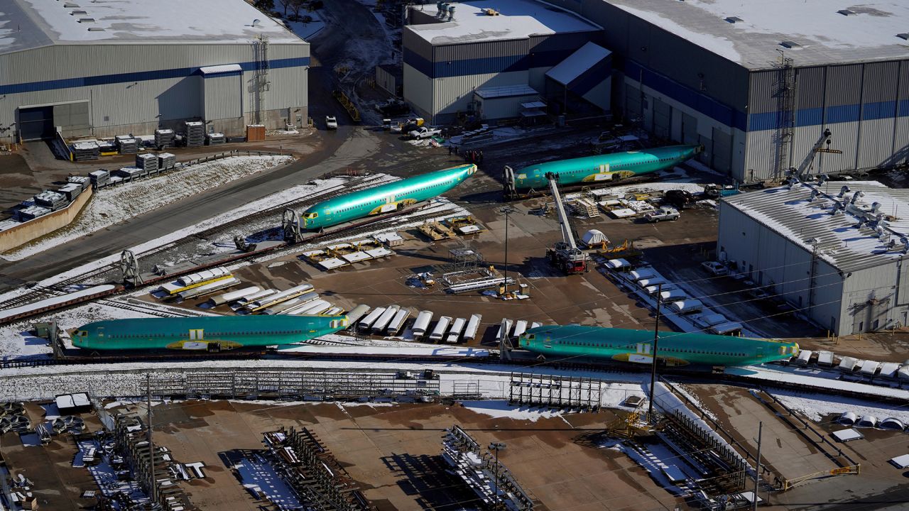 Airplane fuselages bound for Boeing's 737 Max production facility await shipment on rail sidings at their top supplier, Spirit AeroSystems Holdings, in Wichita, Kansas, U.S. December 17, 2019.