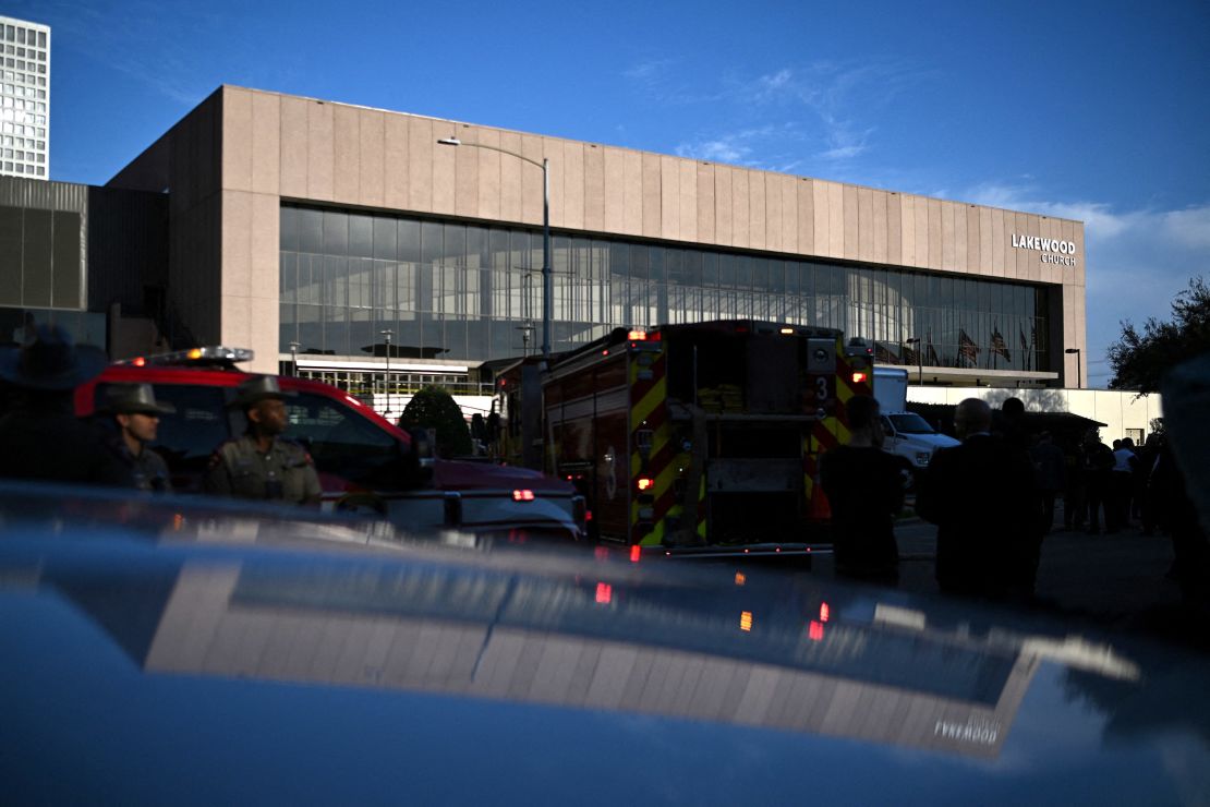 First responders and members of law enforcement cordon off the area after a shooting Sunday at television evangelist Joel Osteen's Lakewood church in Houston.