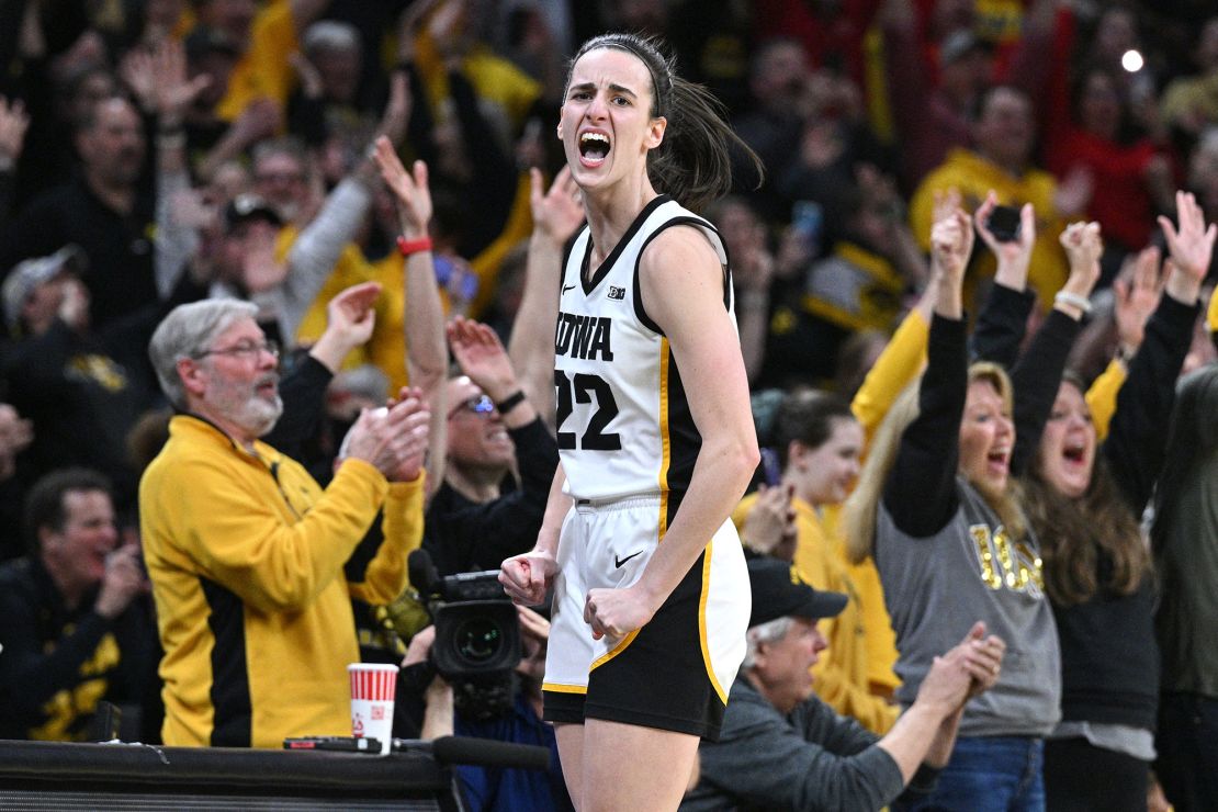Clark celebrates after becoming women's college basketball's leading scorer.