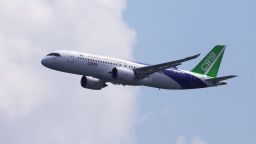 A Comac C919 flies past during an aerial flying display ahead of the Singapore Airshow at Changi Exhibition Centre in Singapore February 18, 2024. REUTERS/Edgar Su