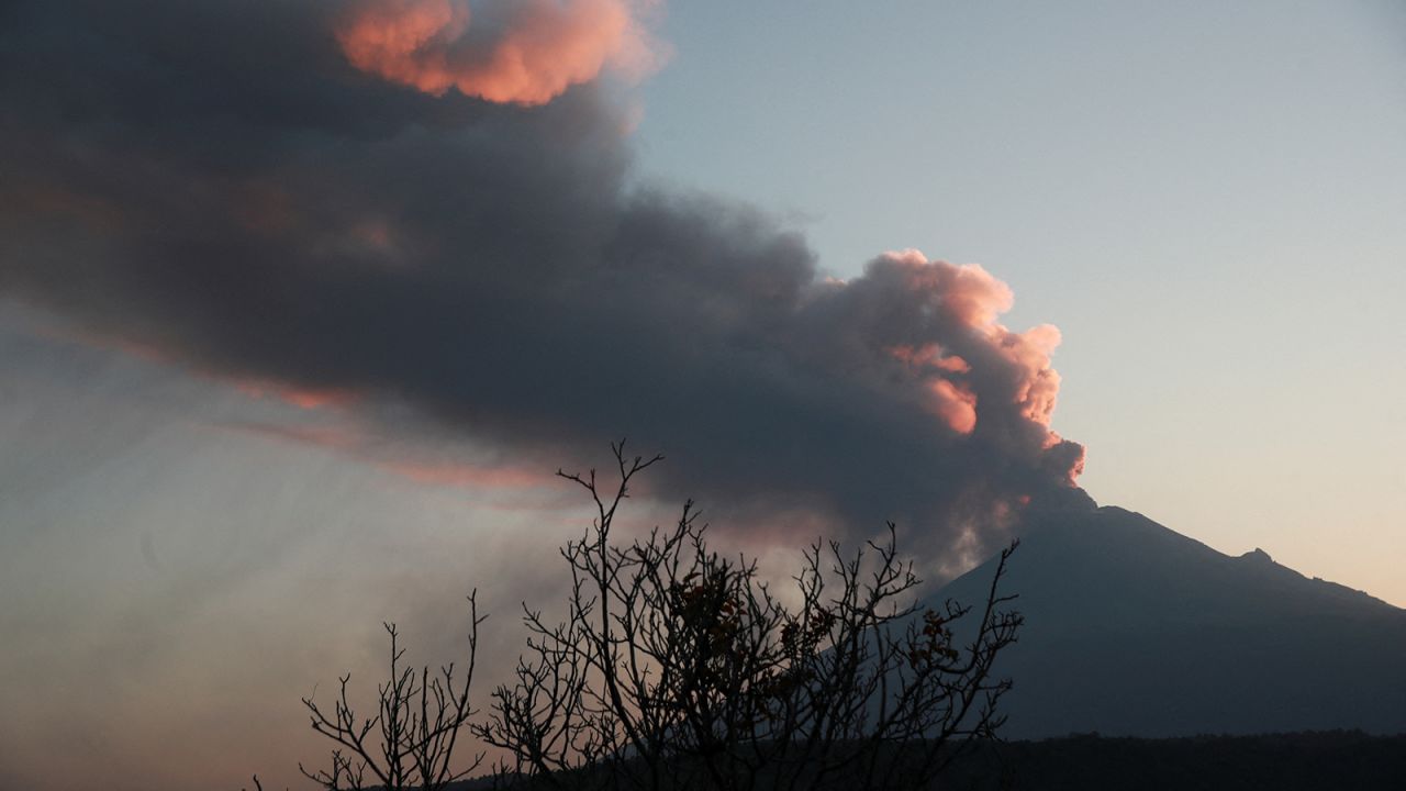Popocatepetl volcano spews a column of ash and smoke as authorities declare a yellow alert after an increase in volcanic activity, as seen from Santiago Xalitzintla, in the state of Puebla, Mexico, February 22, 2024.