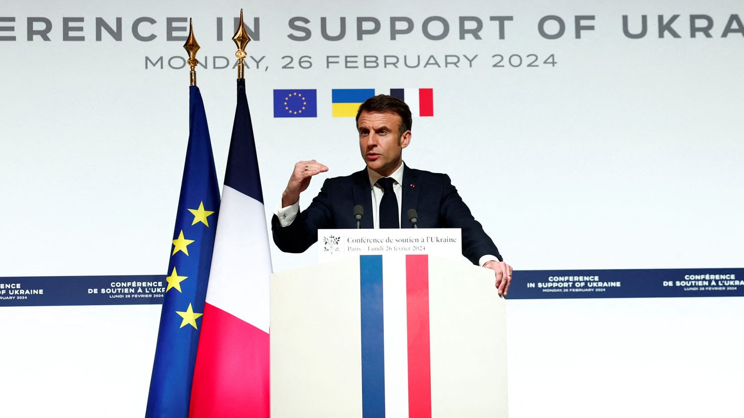 French President Emmanuel Macron speaks at a news conference at the end of the conference on Monday.