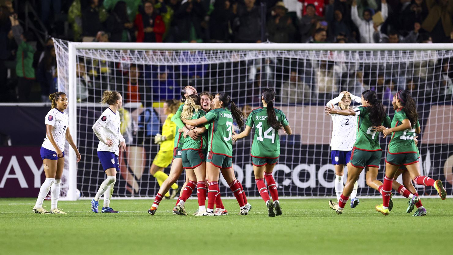 Mexico's Mayra Pelayo-Bernal celebrates with her teammates after scoring a goal against the US.
