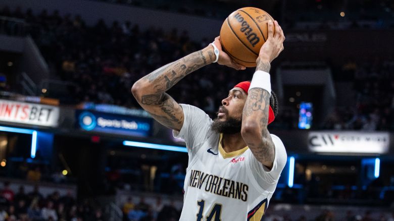 Feb 28, 2024; Indianapolis, Indiana, USA; New Orleans Pelicans forward Brandon Ingram (14) shoots the ball in the first half against the Indiana Pacers at Gainbridge Fieldhouse. Mandatory Credit: Trevor Ruszkowski-USA TODAY Sports
