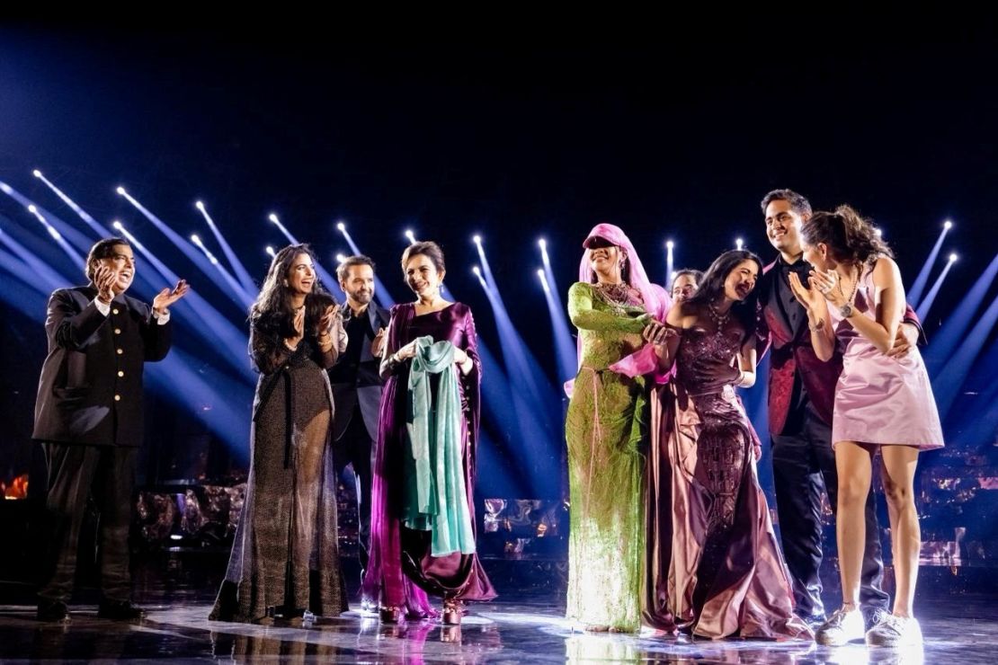 Rihanna on stage alongside the bride, groom, members of the Ambani family and other guests.