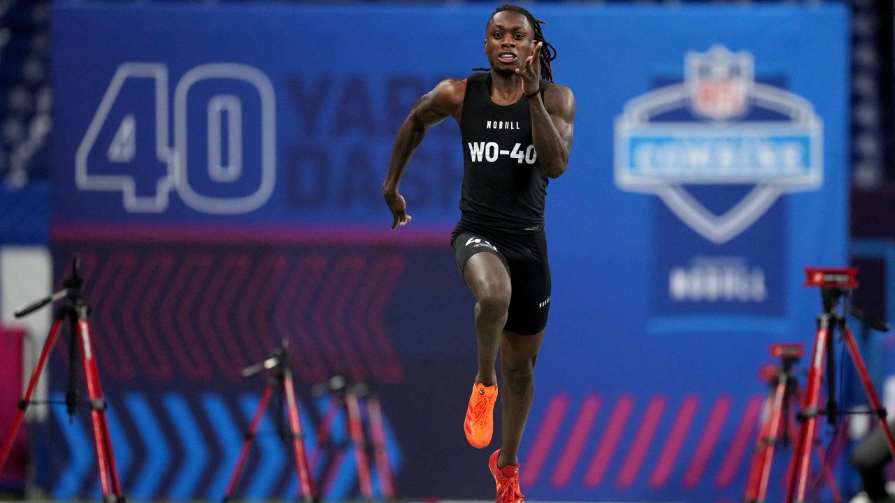 Mar 2, 2024; Indianapolis, IN, USA; Texas wide receiver Xavier Worthy (WO40) ran an official time of 4.21 seconds to set a combine record during the 2024 NFL Combine at Lucas Oil Stadium.
