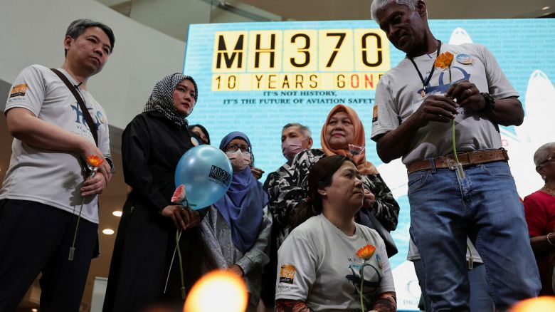 Families of passengers from both China and Malaysia, who were aboard the missing Malaysia Airlines flight MH370, are seen during a remembrance event commemorating the 10th anniversary of its disappearance, in Subang Jaya, Malaysia March 3, 2024. REUTERS/Hasnoor Hussain