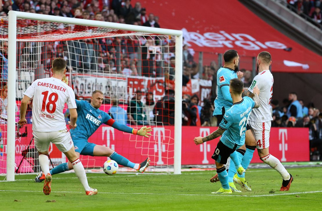 Grimaldo scores Leverkusen's second goal against Köln.