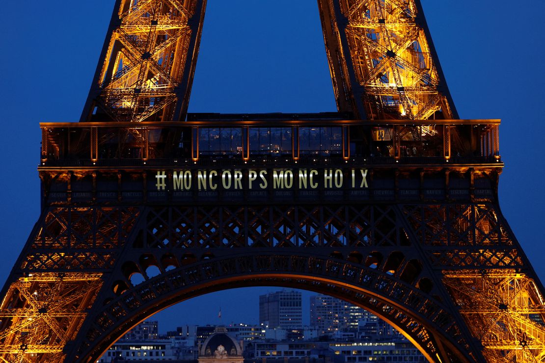 The Eiffel Tower lights up with the message "my body my choice" after the vote on Monday.