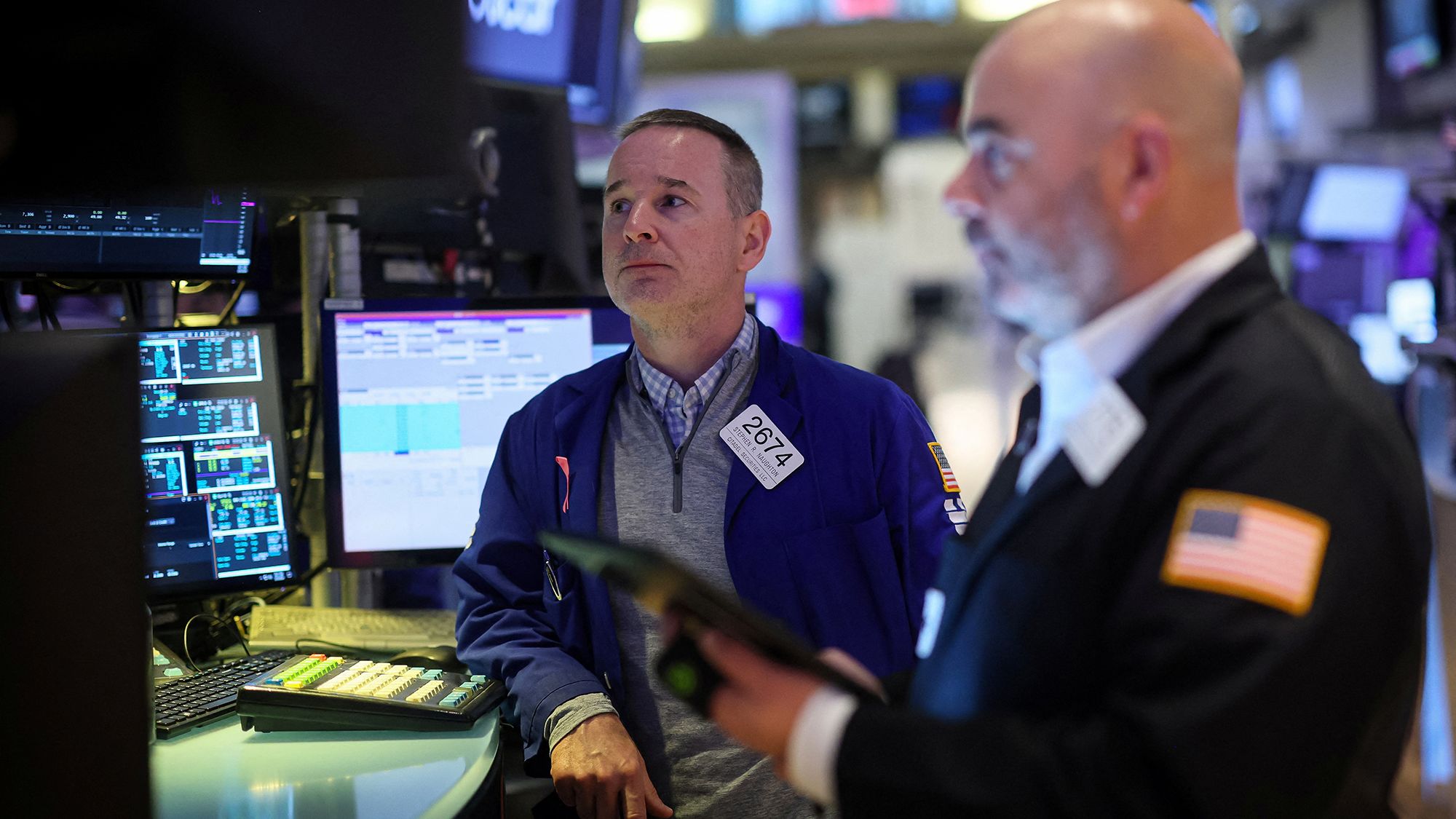 Traders work on the floor at the New York Stock Exchange on March 5, 2024.