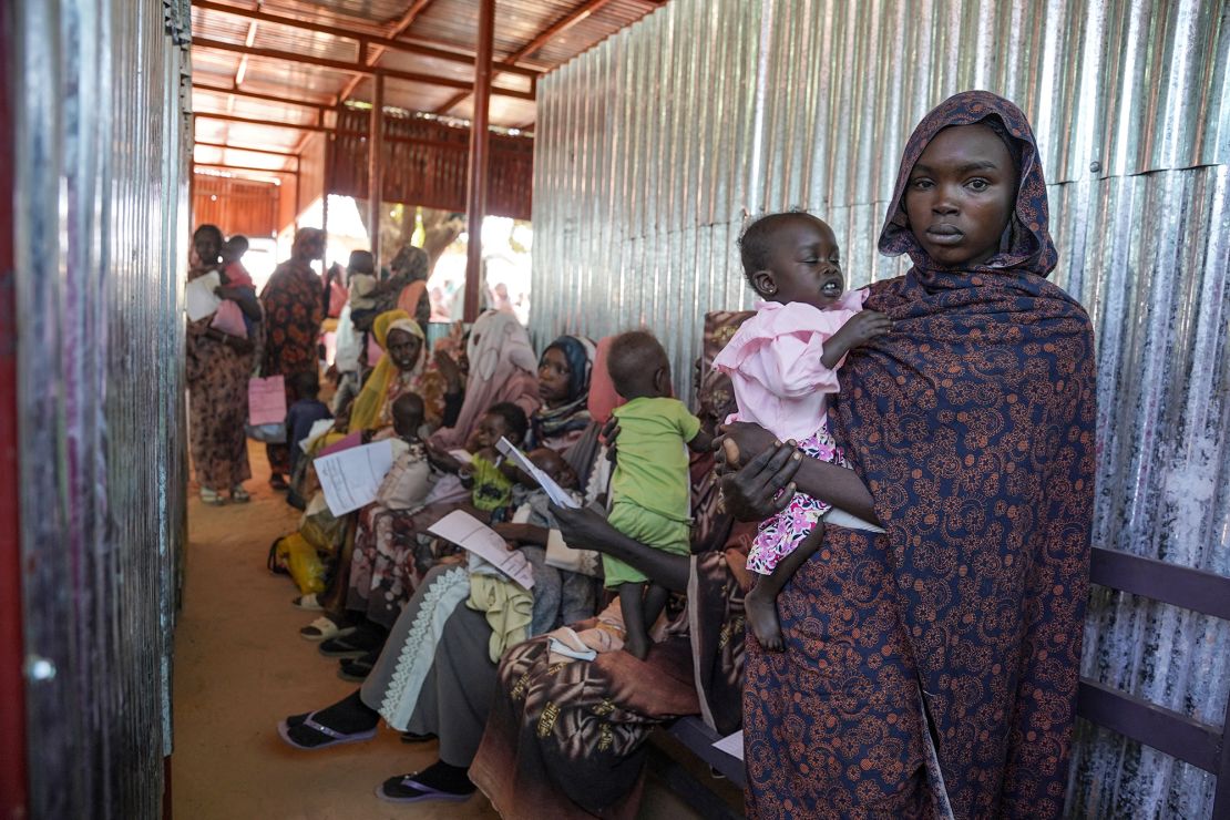 A woman and baby are seen at the Zamzam displacement camp, close to El Fasher in North Darfur, Sudan in 2018.