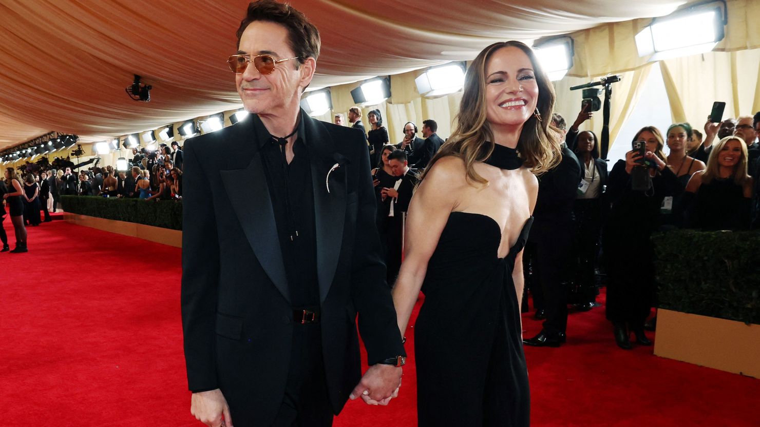 Robert Downey Jr. and Susan Downey walk the red carpet during the Oscars arrivals at the 96th Academy Awards in Hollywood, Los Angeles, California, U.S., March 10, 2024.