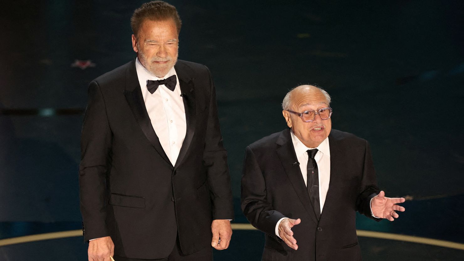 Arnold Schwarzenegger and Danny DeVito at the Oscars on March 10.