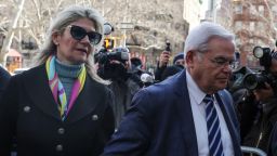 Sen. Bob Menendez, right, and his wife Nadine, left, arrive for their arraignment on a new 18-count indictment that added obstruction charges to bribery and other corruption charges that the New Jersey Democrat already faced, at Manhattan federal court in New York City on March 11.