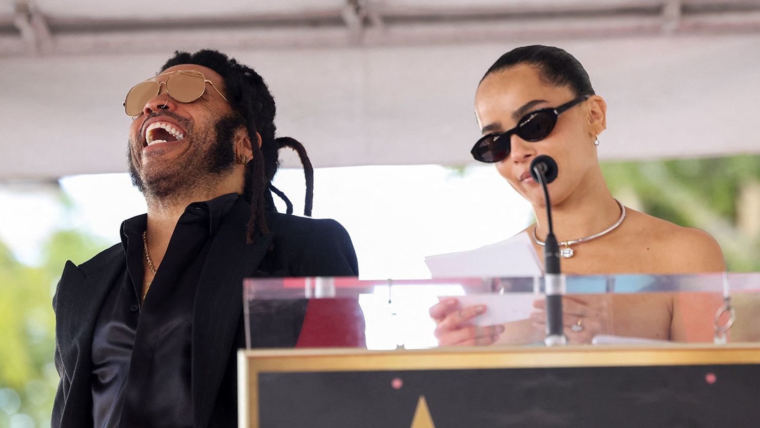 Lenny Kravitz reacts as Zoë Kravitz speaks during the unveiling ceremony of his star on the Hollywood Walk of Fame, in Los Angeles, California, U.S. March 12, 2024.