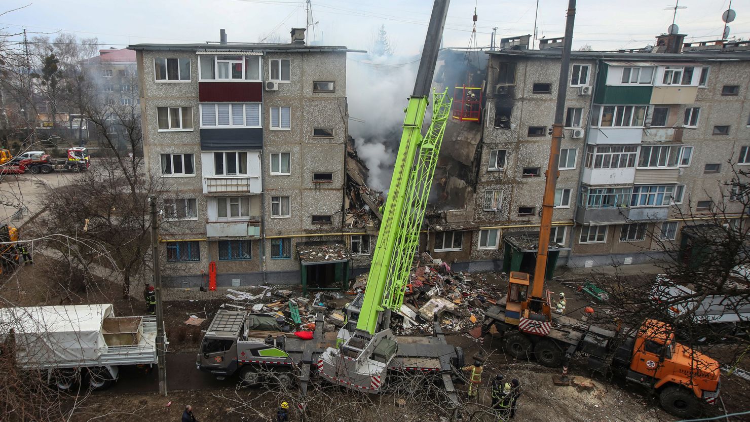 A view shows an apartment building heavily damaged by a Russian drone strike in Sumy, Ukraine, on March 13, 2024.