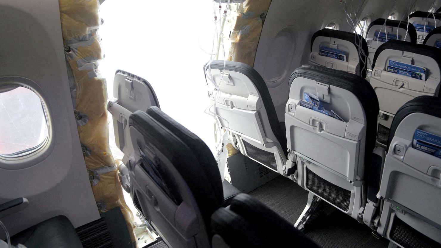 FILE PHOTO: The fuselage plug area of Alaska Airlines Flight 1282 Boeing 737-9 MAX, which was forced to make an emergency landing with a gap in the fuselage, is seen during its investigation by the National Transportation Safety Board (NTSB) in Portland, Oregon, U.S. January 7, 2024. NTSB/Handout via REUTERS. THIS IMAGE HAS BEEN SUPPLIED BY A THIRD PARTY/File Photo