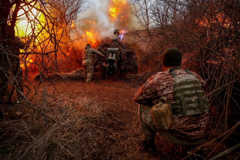 Ukrainian servicemen of the 126th Separate Territorial Defence Brigade fire a D-30 howitzer towards Russian troops at a position in a front line, amid Russia's attack on Ukraine, in Kherson region, Ukraine March 12, 2024. Radio Free Europe/Radio Liberty/Serhii Nuzhnenko via REUTERS