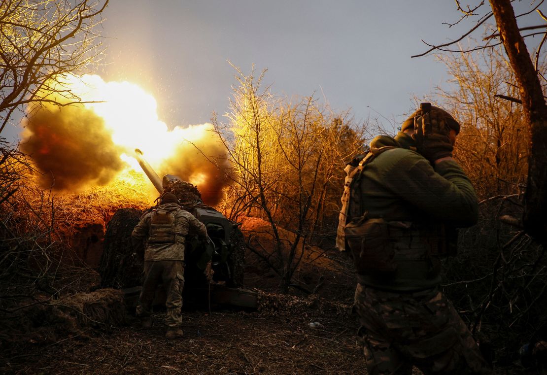 A Ukrainian servicemen fires a howitzer towards Russian troops in Kherson region, Ukraine, in March.