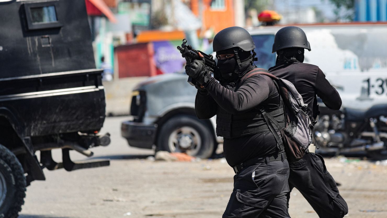 Police officers take part in an operation near the National Penitentiary following a fire in Port-au-Prince, Haiti, March 14, 2024.