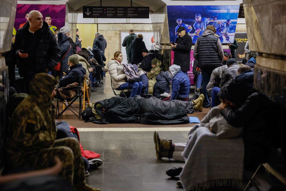 Ukrainians shelter inside a Kyiv metro station during a Russian missile strike on March 21.