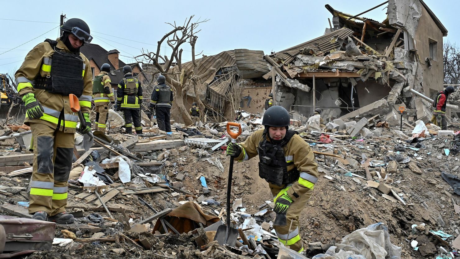 Emergency services respond to a missile strike on residential buildings in Zaporizhzhia, Ukraine, March 22, 2024.