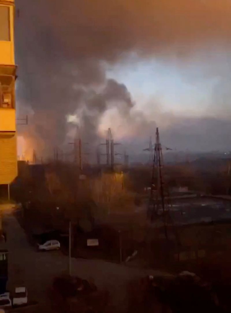 Smoke rises during the aftermath of what Ukraine's state hydropower company says is a Russian missile strike on Ukraine's largest dam, the DniproHES in Zaporizhzhia, Ukraine March 22, 2024, in this screengrab obtained from a social media video. VIDEO OBTAINED BY REUTERS/via REUTERS  NO RESALES. NO ARCHIVES.