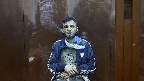 Dalerdzhon Mirzoyev, a suspect in the shooting attack at the Crocus City Hall concert venue, sits behind a glass wall of an enclosure for defendants at the Basmanny district court in Moscow, Russia March 24, 2024. REUTERS/Shamil Zhumatov