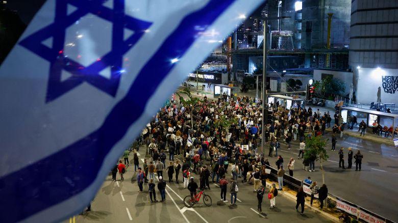 People block a road during a demonstration calling for the return of hostages held in Gaza since October 7, blaming Israeli Prime Minister Benjamin Netanyahu for the break down of the U.S. brokered hostage talks in Qatar, amid the ongoing conflict between Israel and Palestinian Islamist group Hamas, in Tel Aviv, Israel March 26, 2024. REUTERS/Carlos Garcia Rawlins