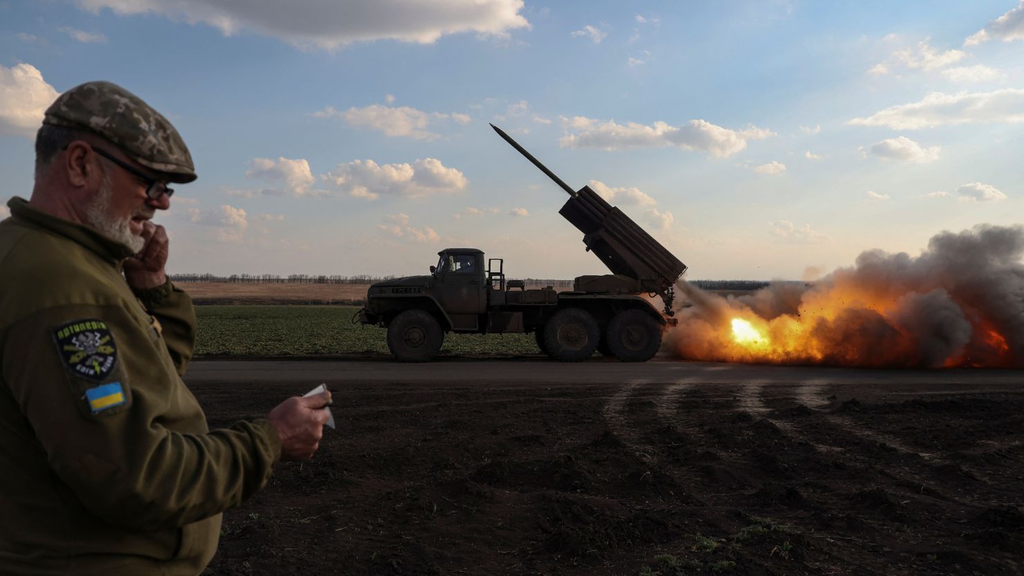 Ukrainian service members fire a BM-21 Grad multiple launch rocket system (MLRS) towards the Russian troops near a front line in the Donetsk region of Ukraine on March 27.