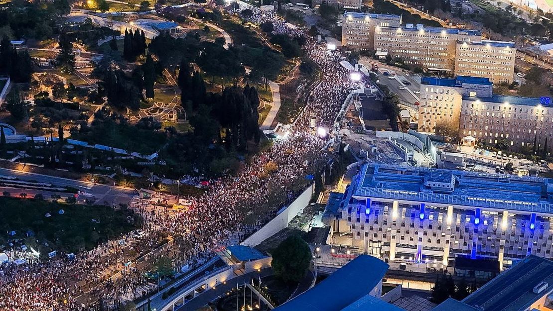 A drone view of anti-government protesters launch a prolonged demonstration calling for Israeli Prime Minister, Benjamin Netanyahu's government to resign and a general election in the wake of the deadly October 7 attack on Israel by the Palestinian Islamist group Hamas and the ensuing war in Gaza, in front of the Knesset, Israeli parliament in Jerusalem, March 31, 2024. REUTERS/Ilan Rosenberg TPX IMAGES OF THE DAY